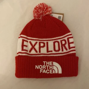 The north face Explore - Helt ny och oanvänd mössa från the north face. Nypris: 340 kr