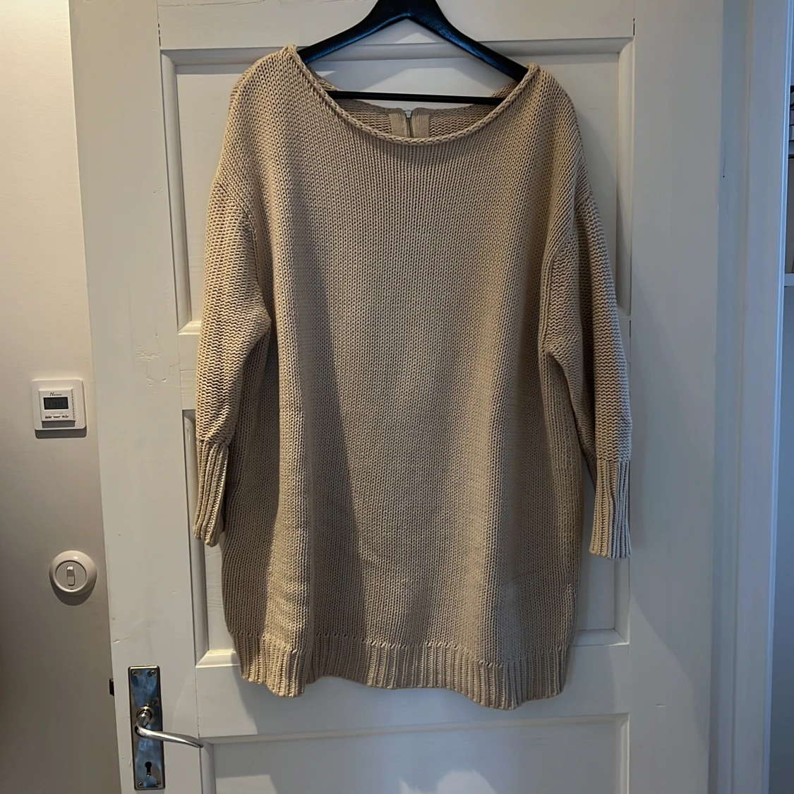 Lång stickad tröja från acne