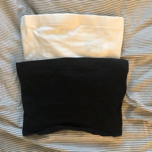 Svart och vitt linne - Två linnen utan band. Supersköna och snygga men tyvärr för små. Storlek XS, passar dig med mindre byst. Köp båda för 20kr eller 15kr/styck + frakt. 