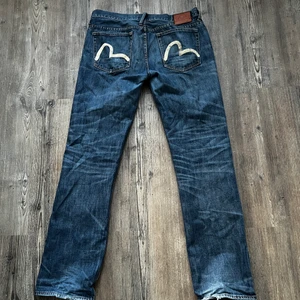 Evisu jeans - W32-34 L36 Tar även byten