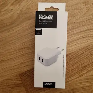 Dual USB charger Two usb-A ports Max. 4.8 A. Oöppnad förpackning 