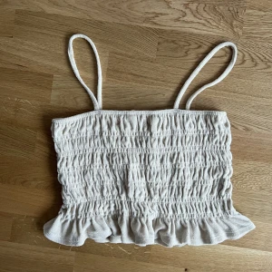 Linne - Tajt stretchy linne med öppen änd, okej skick.