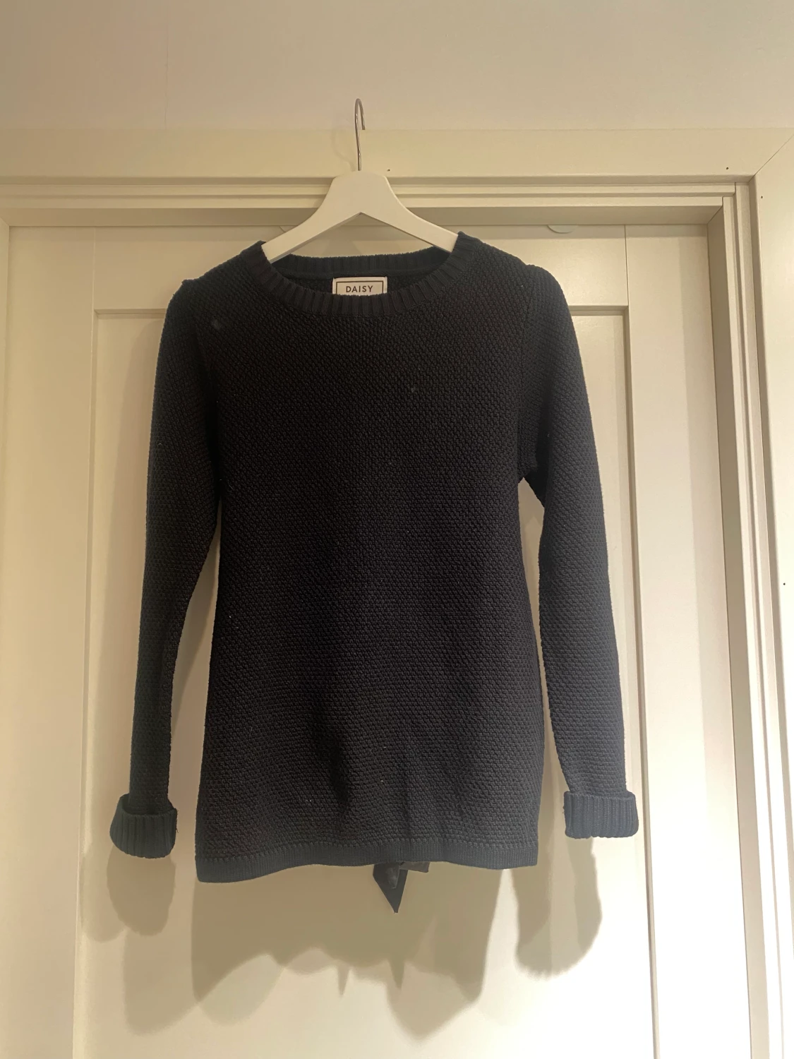 Stickad tröja från Daisy Grace