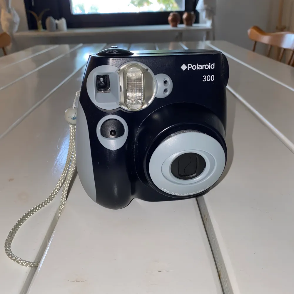 Polaroidkamera med 4 olika inställningar  Fint skick. Övrigt.