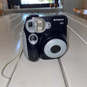 Polaroidkamera med 4 olika inställningar  Fint skick