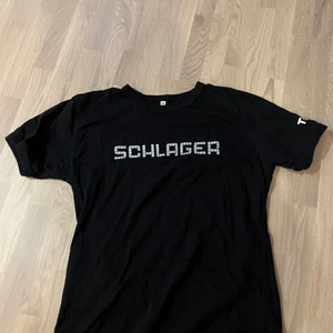 Schlager t-shirt  - härlig t-shirt till mello-säsongen