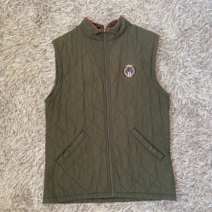 Lexington väst  - Mörkgrön väst från lexington. Aldrig använd. 