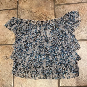 See throug top - Blue see-through top. Material: 100%Polyester Size: M