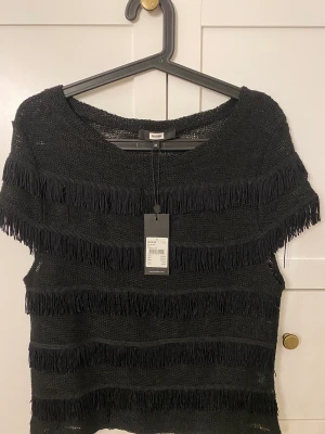 Ruffsig topp  - En jätte söt skimmrig topp perfekt för en utekväll, aldrig använd med prislapp på.