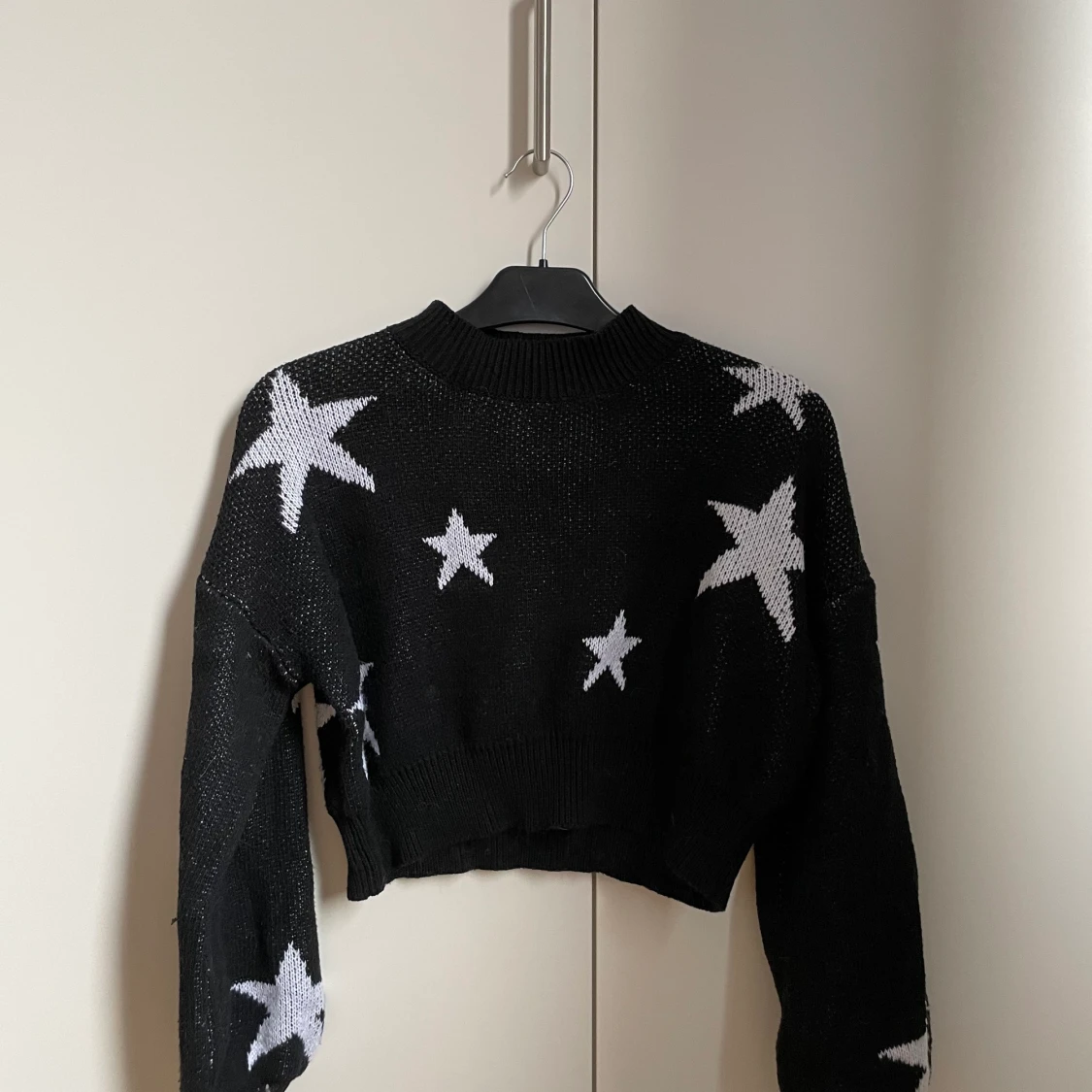 Stickad tröja med stjärnor 
