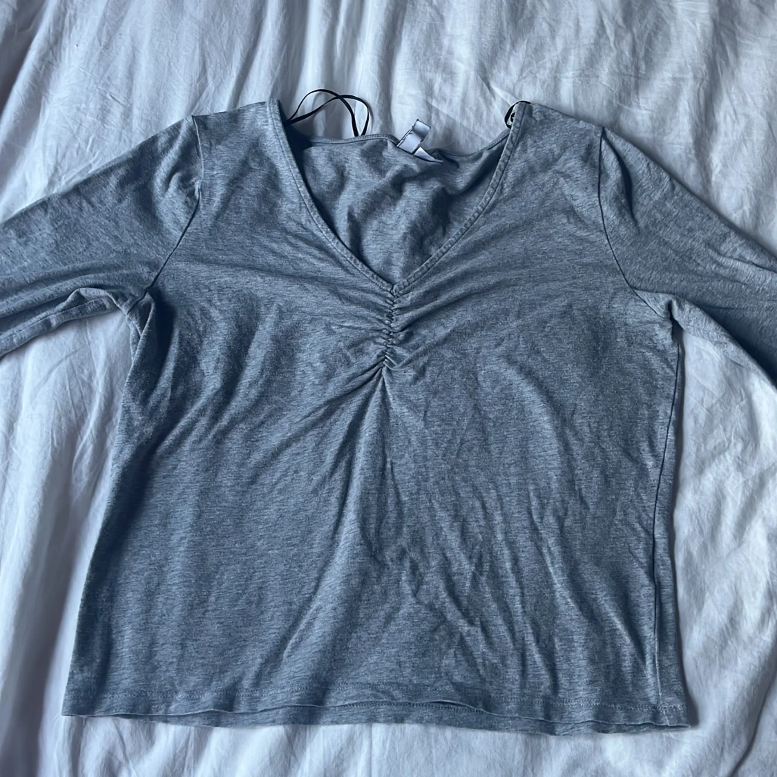 Grå långärmad tröja