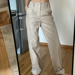 Beige Relaxed pants - Casual relaxed pants, never used as too big for me. Very nice material also can be used with high heels