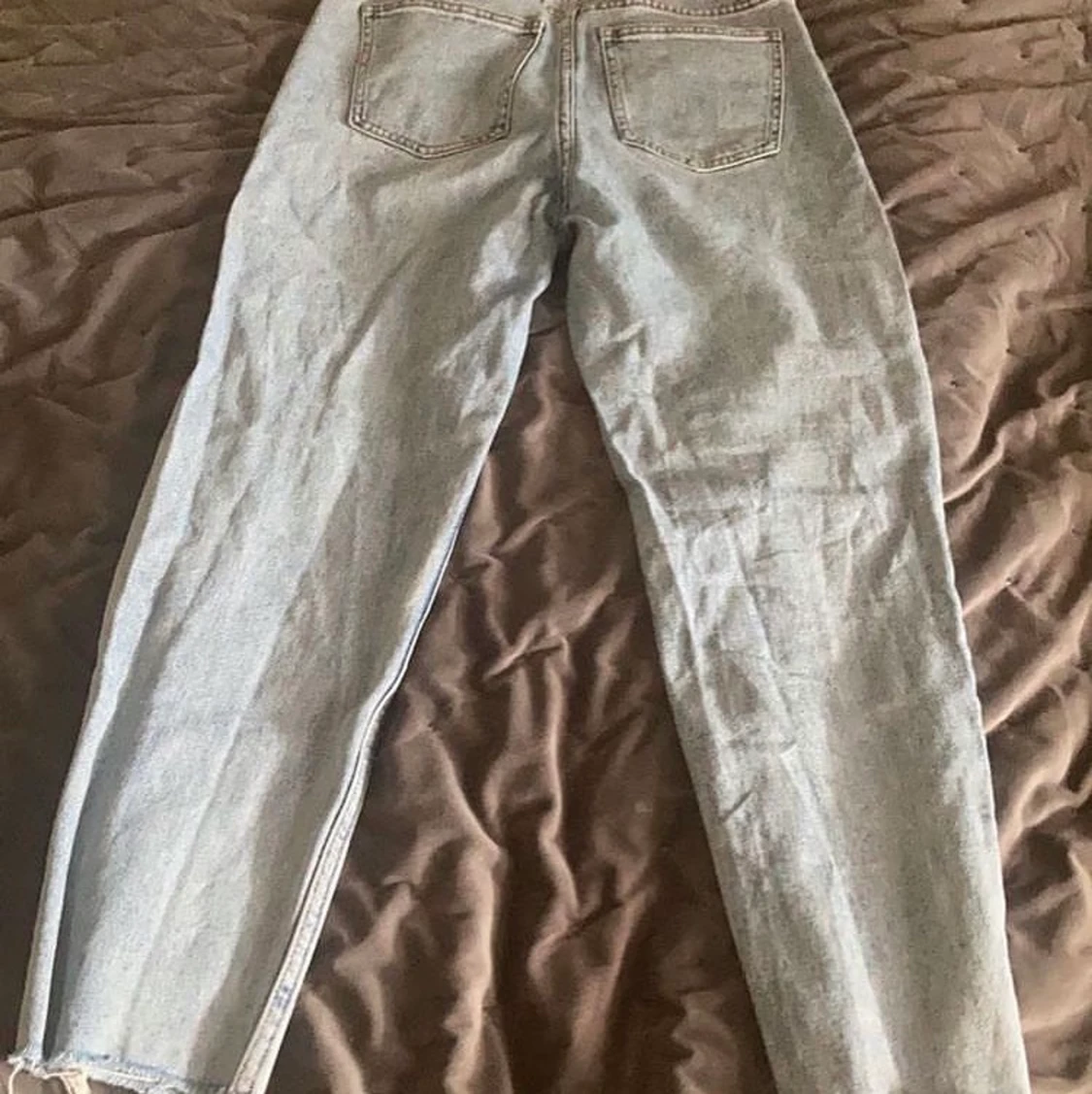 Ett par blåa jeans  - 90