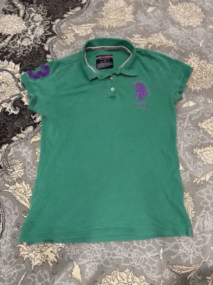 U.S. Polo Assn Green Polo Shirt - U.S. Polo Assn. green polo shirt, tagged size L (runs small / junior fit, more like women’s XS or kids 12-14). Excellent condition.
