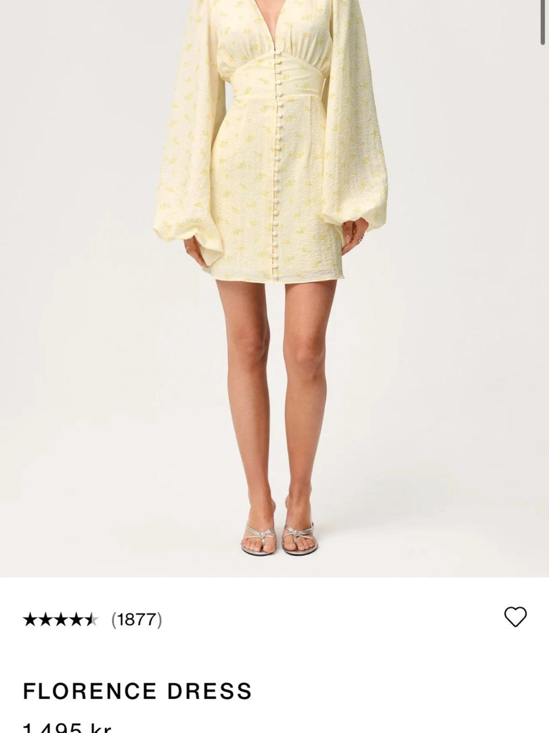 Gulblommig kort klänning med puffärm