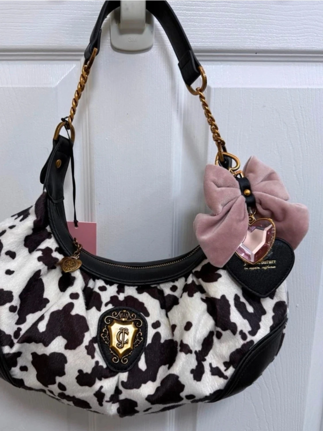 Juicy Couture axelväska med ko-mönster