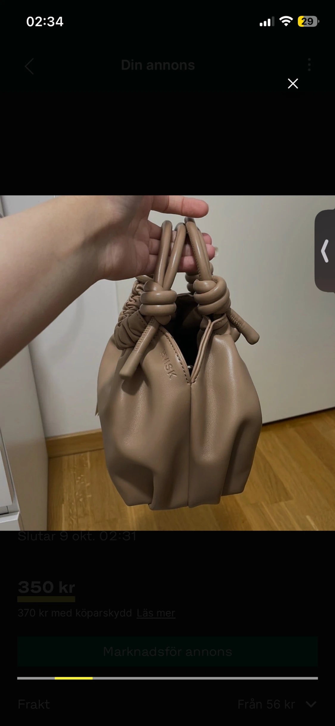 Beige bucket bag med knutdetaljer