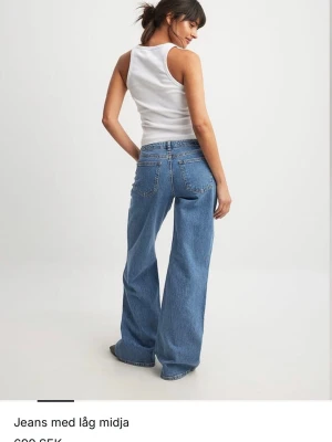 Blåa low waist wide leg jeans - Jeans från nakd. Typ helt nya använt 5 gånger 
