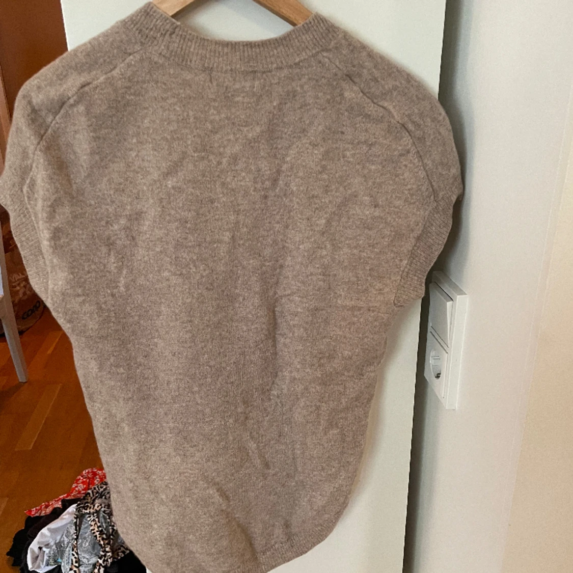 Stickad väst från Wera - 91