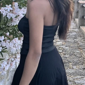 svarta tubbtop - en svart tubb topp