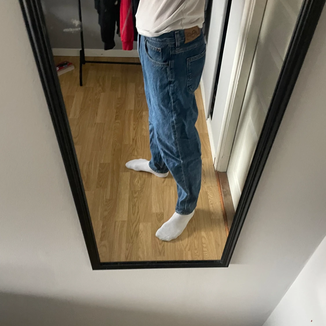 Blåa lee jeans