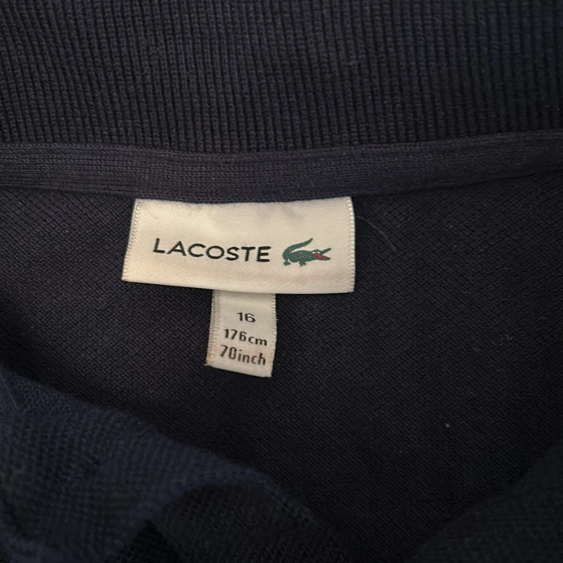 Mörkblå Lacoste piké  - 91