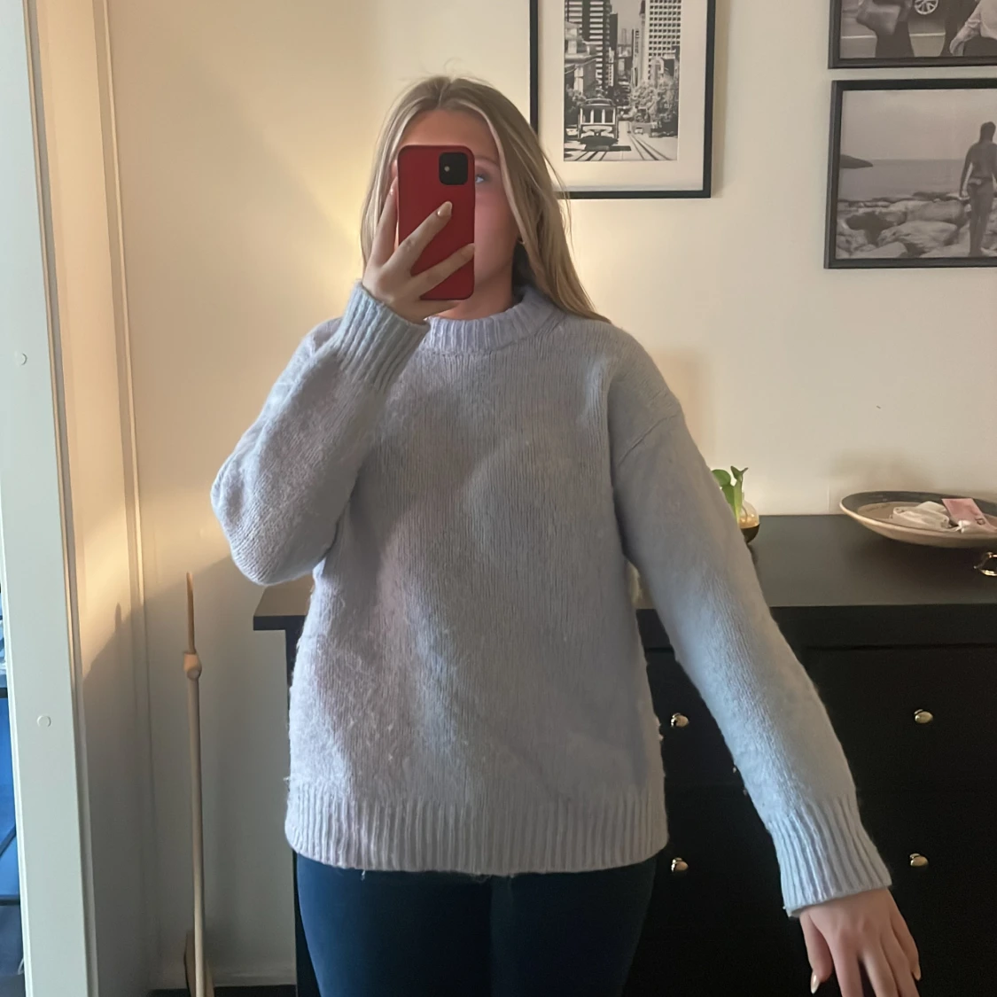 Stickad ljusblå tröja