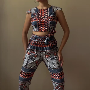Vintage Wax Print Cotton Woven Pants - Beautiful wax print woven pants in navy and orange colors. Handcrafted Pants features an elasticated waistband and a removable matching belt.   Matching Top sold Separately   100% Cotton  Best Fits Size XS/S