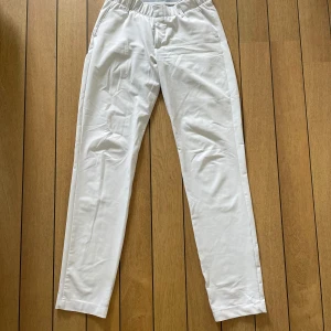 UNDER ARMOUR, golf långbyxor - Vita långbyxor, XS