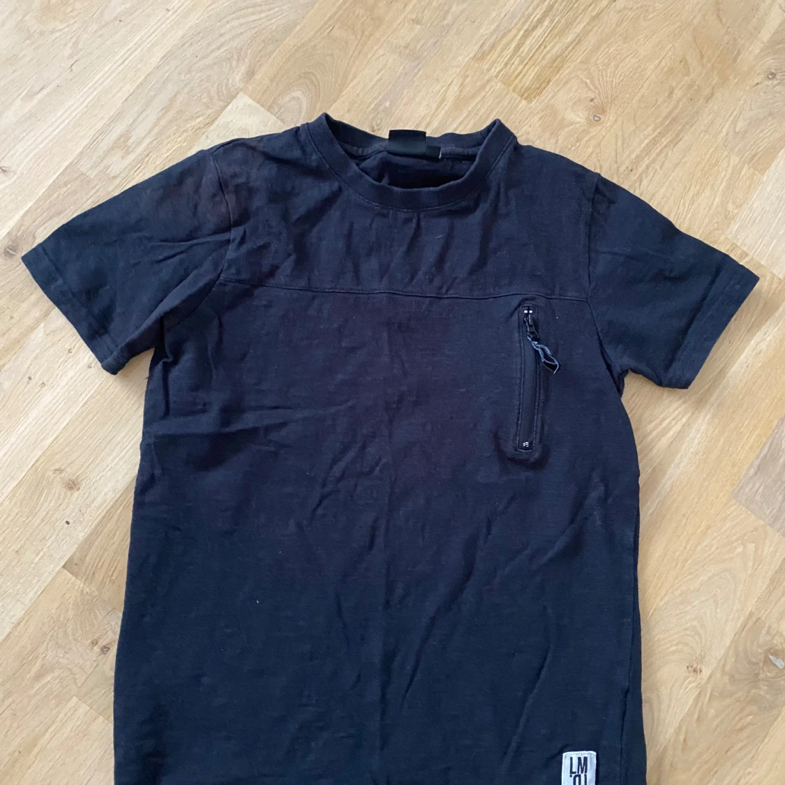 Svart t-shirt strl 146-152 