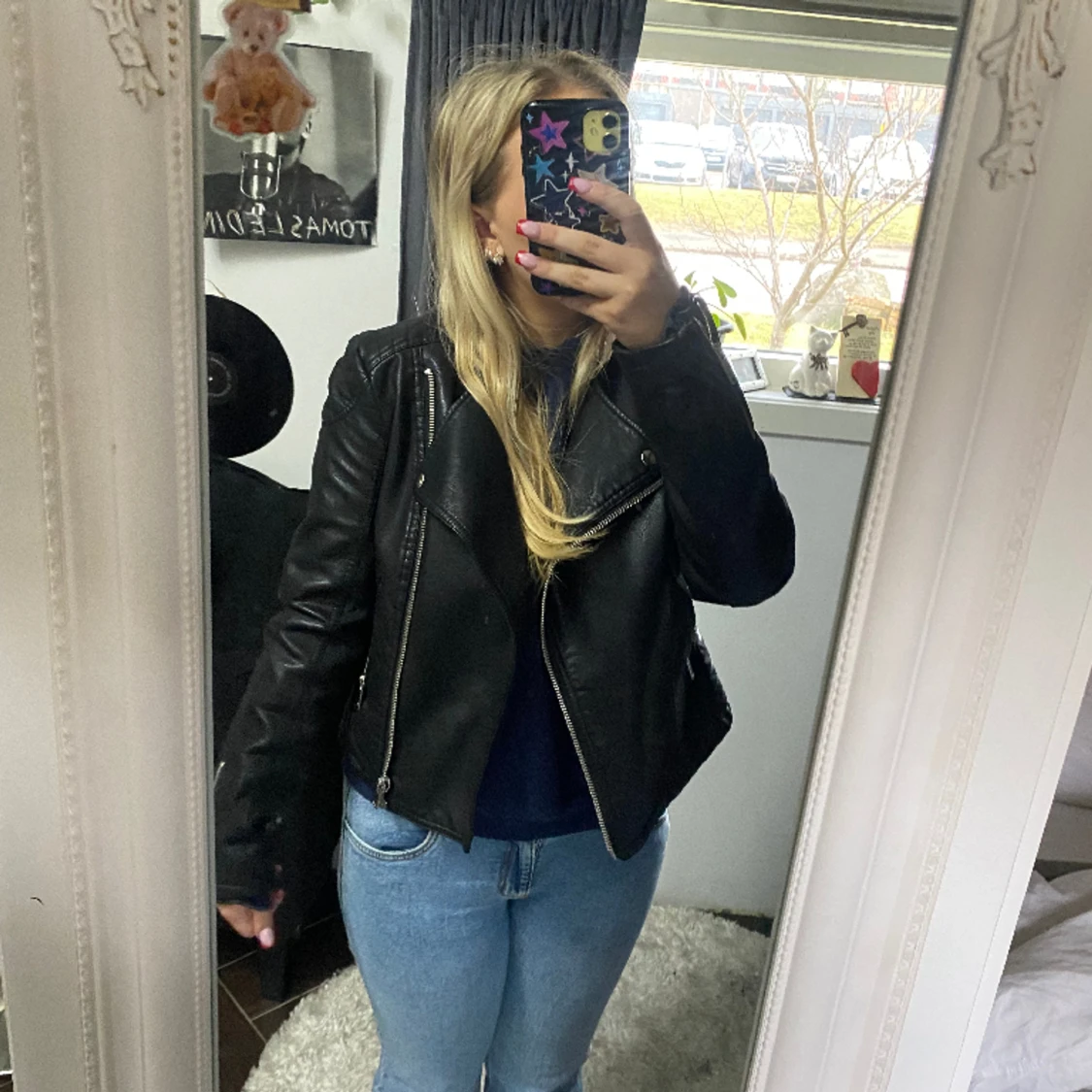 En svart skinn jacka  - 90