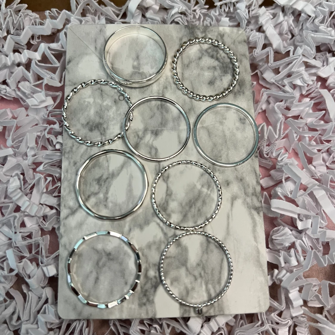 9-pack silvriga ringar