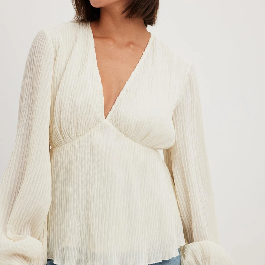 Plisserad blus 
