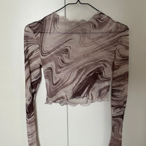 Topp NLY - Fin topp från Nelly. Så gott som ny