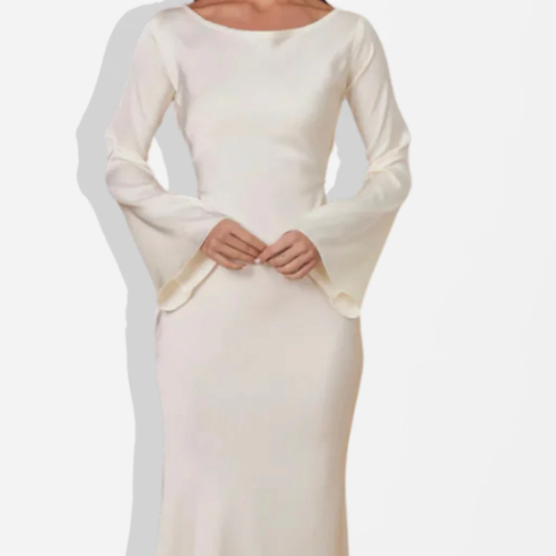 Vit Adamma silkeskläning 