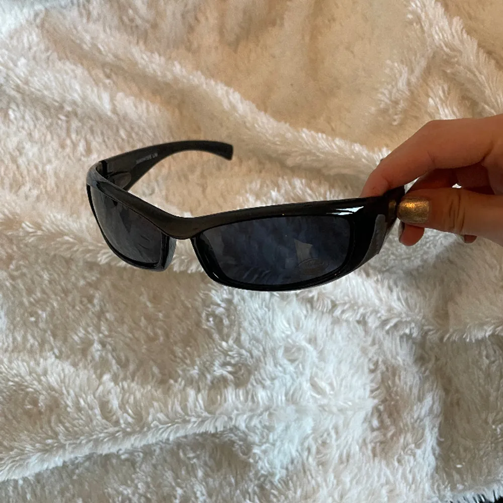 Black sunglasses, UV protection, UNISEX . Övrigt.