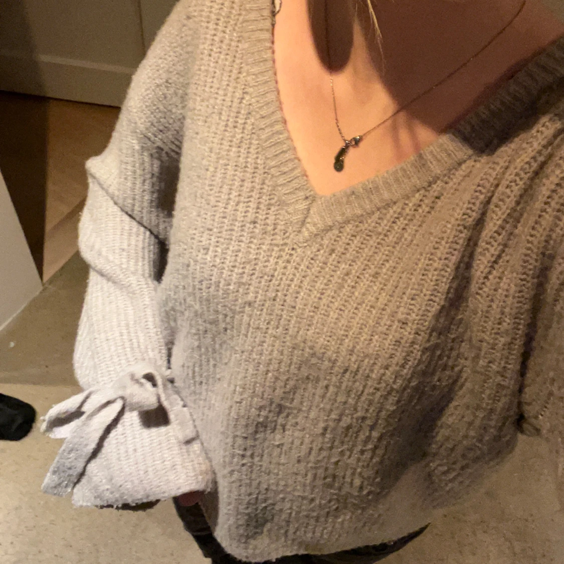 Fin stickad tröja med rosettdetaljer från Nakd !  - 91