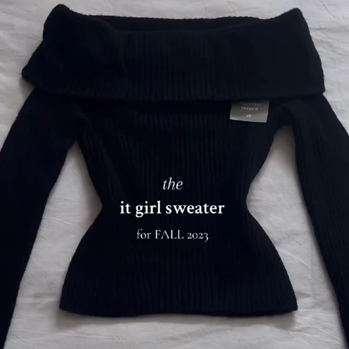 Svart stickad off shoulder