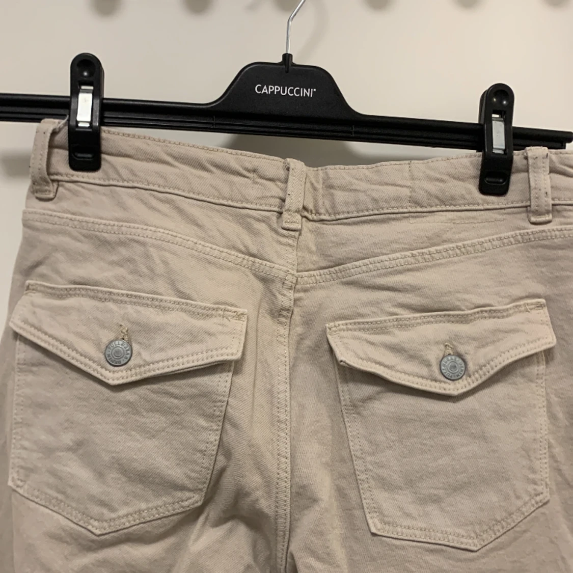 Lågmidjade Jeans Med Knappfickor - 91