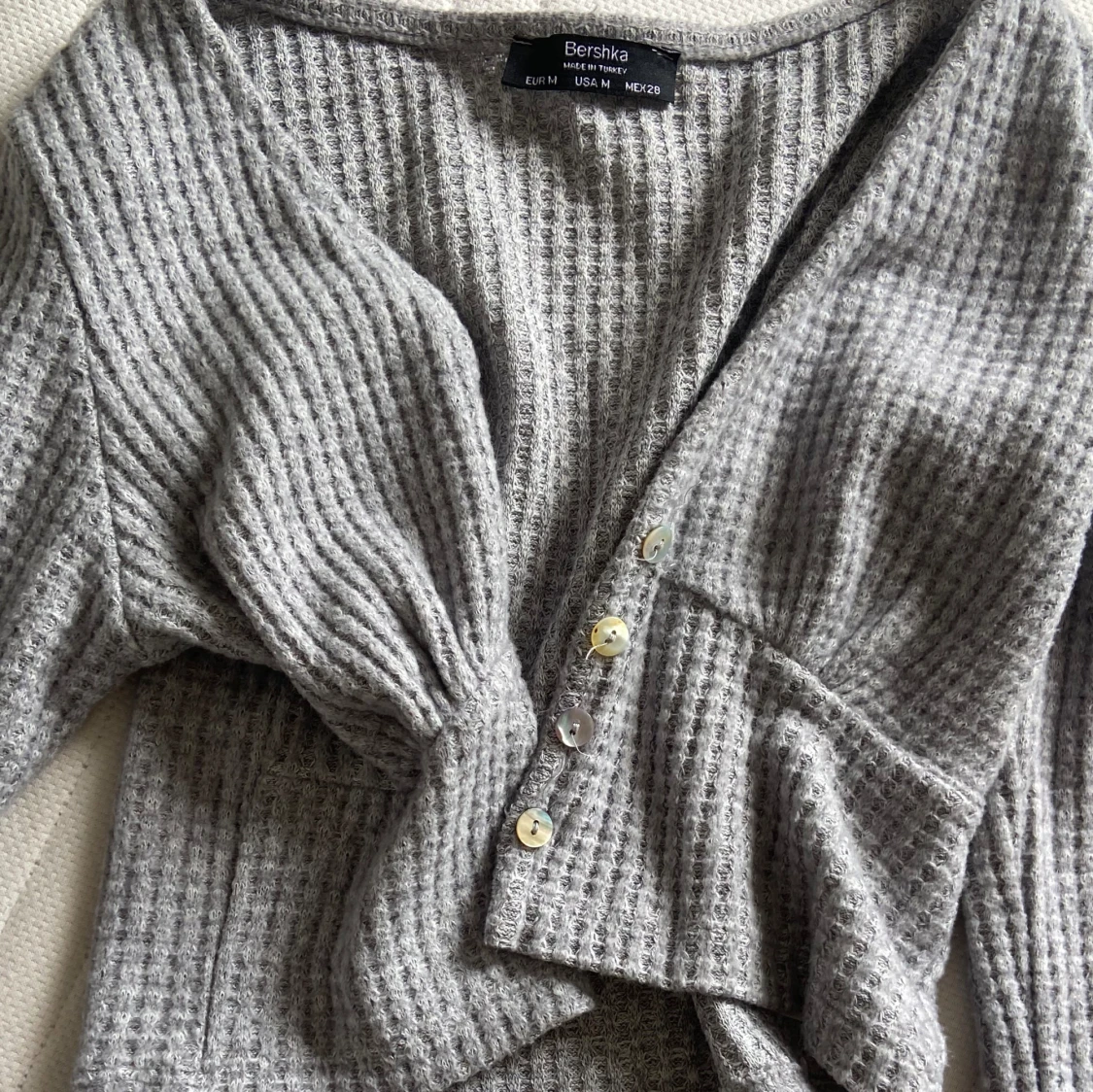 Grå kofta med knappar  - 90