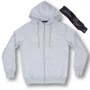 Grå tuttolente zip size L! Väldigt bra skick! Tar bara Swish! Frakt = 58kr