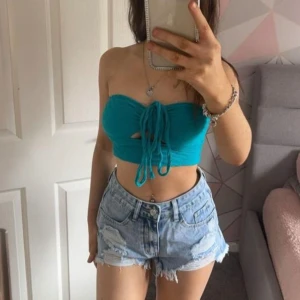 Topp - Blå topp som är använd fåtal gånger