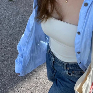 Gina tricot - Säljer den strapless top från Ginatricot i stolek XS. 