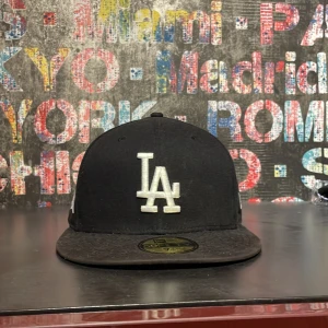 LA keps - Riktigt schysst LA keps i mycket bra skick. Säljer då den var för liten för mig