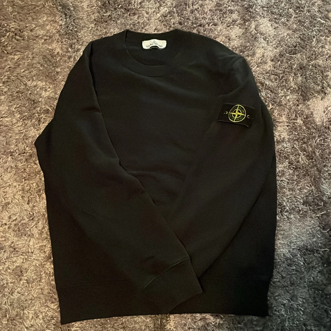 Svart sweatshirt från Stone Island