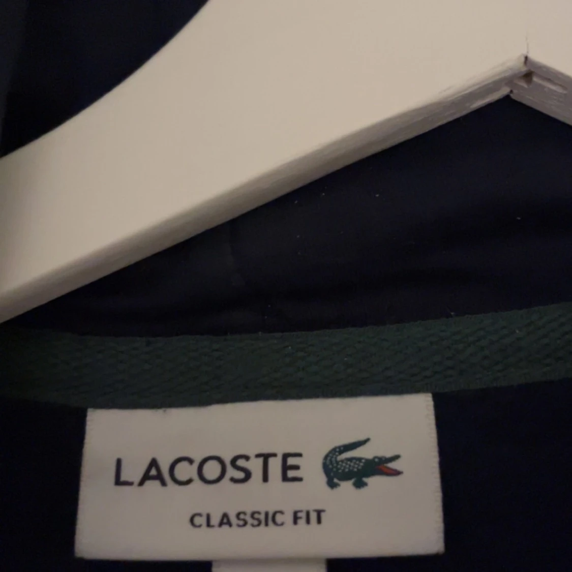 Mörkblå hoodie från Lacoste - 90