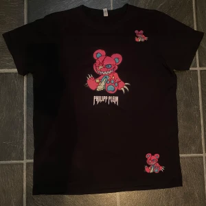 Svart t-shirt Philipp Plein björn - Svart t-shirt från Philipp Plein i storlek M.