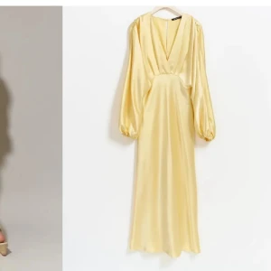 Söker! Xs/S Satin midaxi dress gul - Elegant långklänning i ljusgul satin med v-ringning och långa puffärmar. Klänningen har en mjuk glans, markerad midja och ballongärmar med resår vid handlederna. Perfekt för dig som vill sticka ut med en chic och trendig look.
