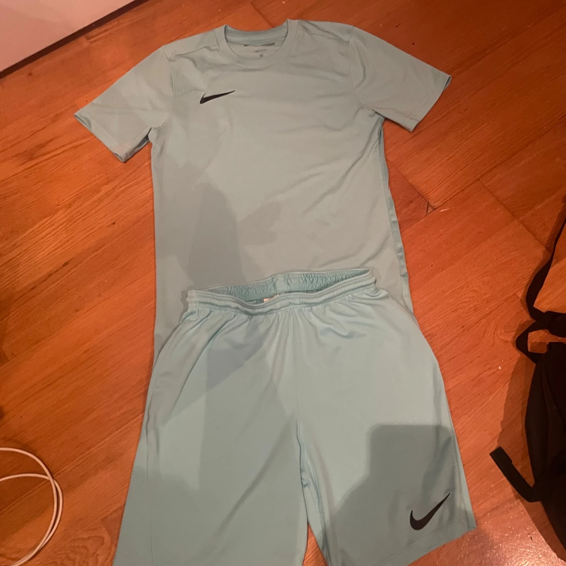Ljusblå nike träningskläder