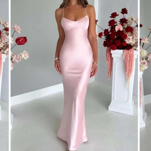 Ljusrosa lyxig satin maxiklänning Isabelle - Säljer en elegant ljusrosa maxiklänning i satin med smala axelband som korsas i ryggen och öppen rygg. Klänningen har en figurnära passform och faller snyggt längs kroppen. Perfekt för bal. Aldrig använt 💕💕💕